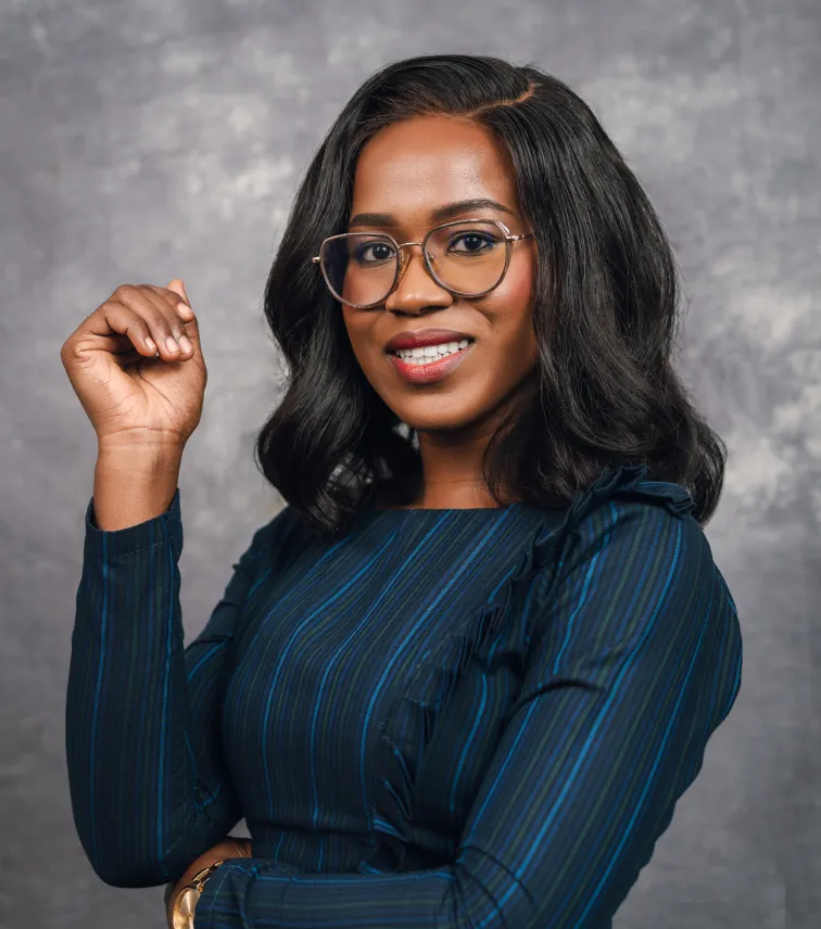 Headshot photo of Esther Timinca